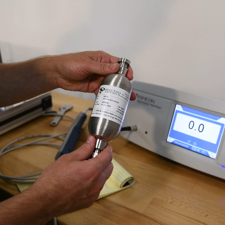 Calibrated sniffer leak standard for verifying hydrogen leak testing accuracy.